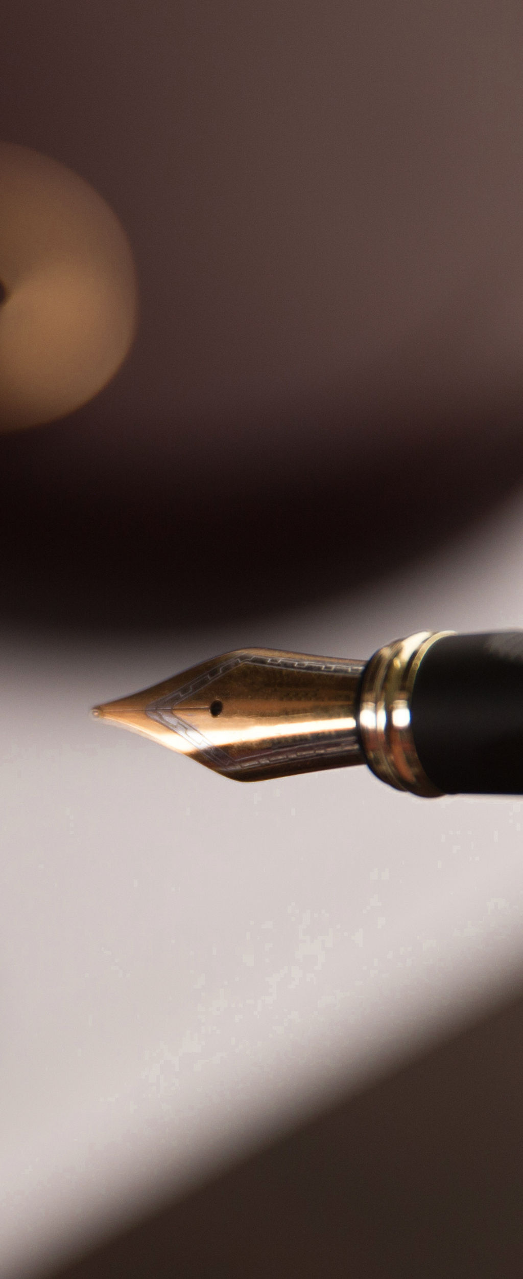 Hands of wife, husband signing decree of divorce, dissolution, canceling marriage, legal separation documents, filing divorce papers or premarital agreement prepared by lawyer. Wedding ring