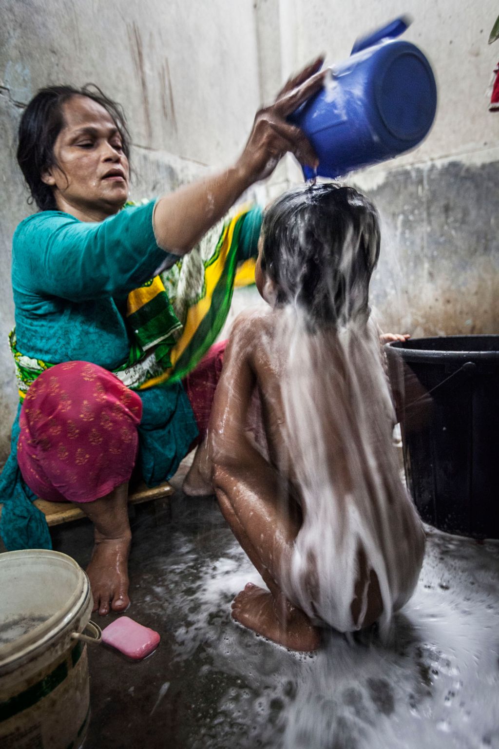 Kids bathing naked Still She Smiles | Shahidul Alam | Prix Pictet